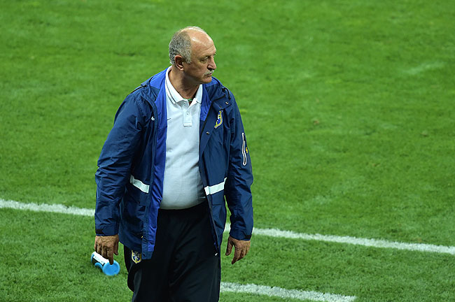 Brazil's coach Luiz Felipe Scolari had to watch in horror as his team fell ever apart at the hands of the impressive Germans