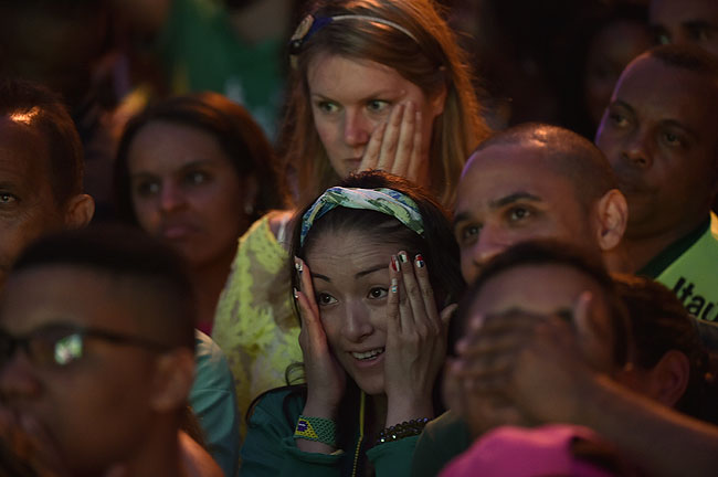 A mixture of disbelief and disappointment was also written on the faces of the Brazil fans