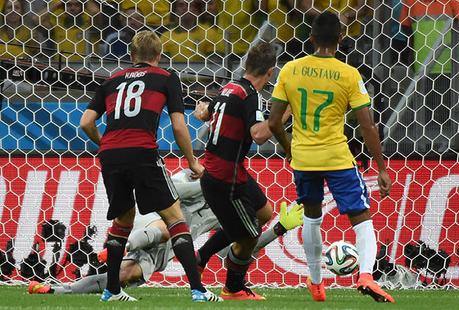 Miroslav Klose moments later became the World Cup's all-time top-scorer after netting his 16th goal in the competition