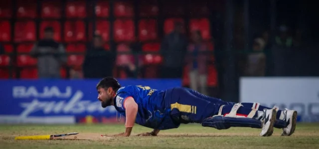 Gulshan Jha celebrates with a push-up after Karnali beat Biratnagar in NPL Season 3 Match 6 at TU Ground, Kirtipur